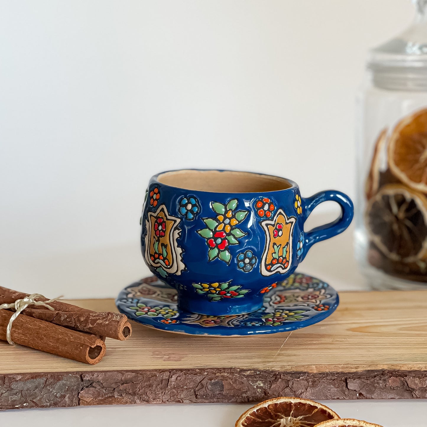Tasse mit Untersetzer