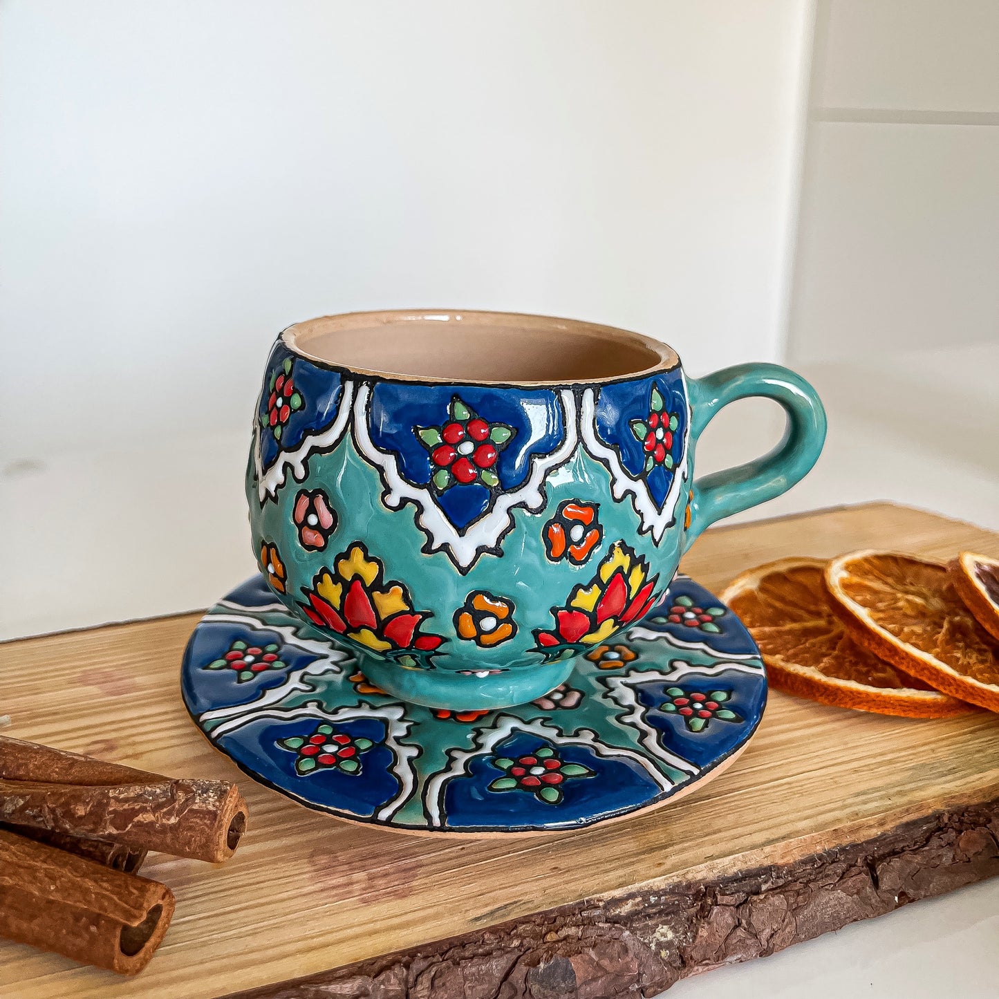 Tasse mit Untersetzer