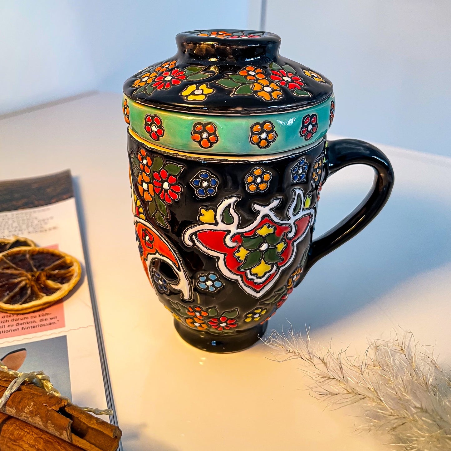 Teetasse mit Deckel und Sieb