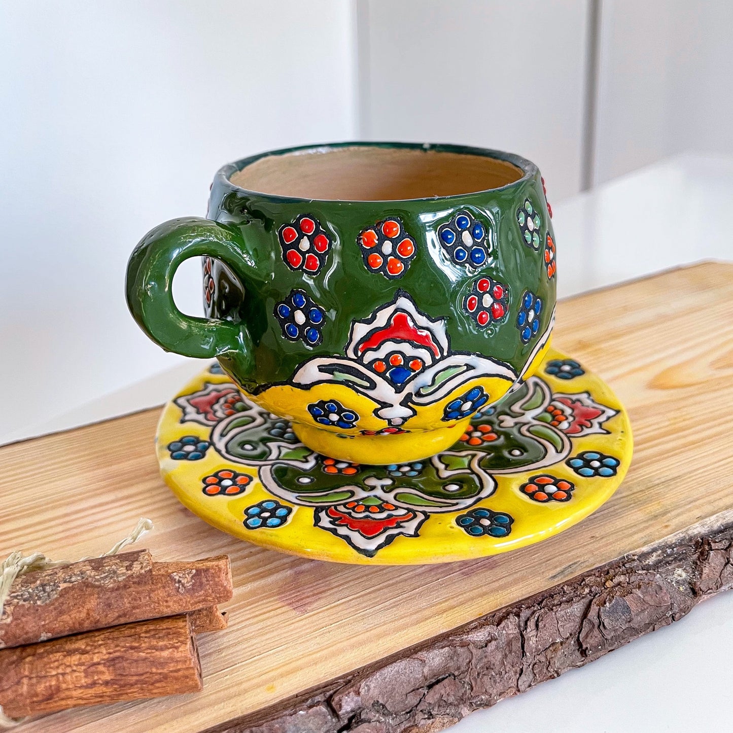 Tasse mit Untersetzer