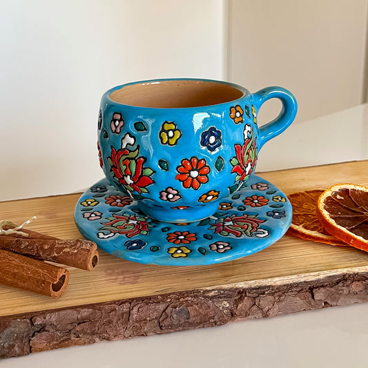 Tasse mit Untersetzer